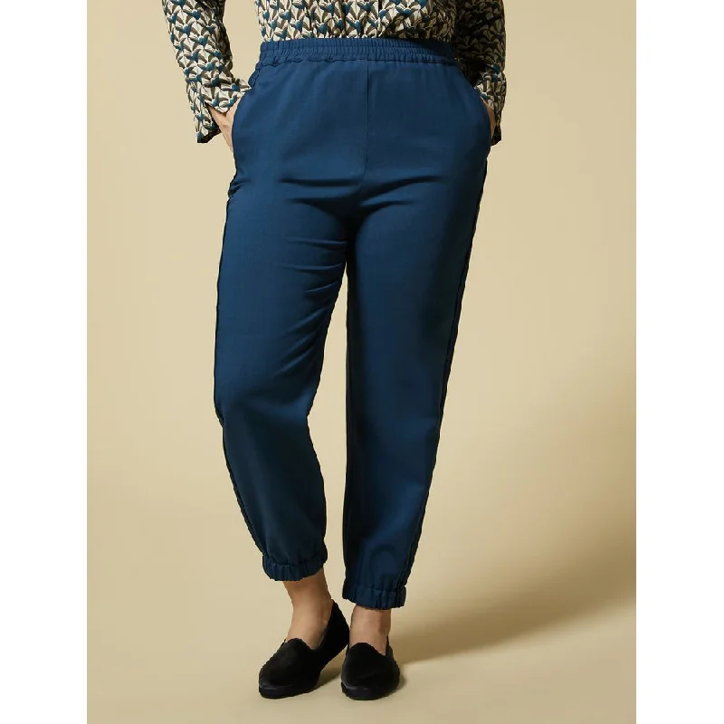 Bold color tight trousers for women with bright hues and daring style choices -ROBERTO