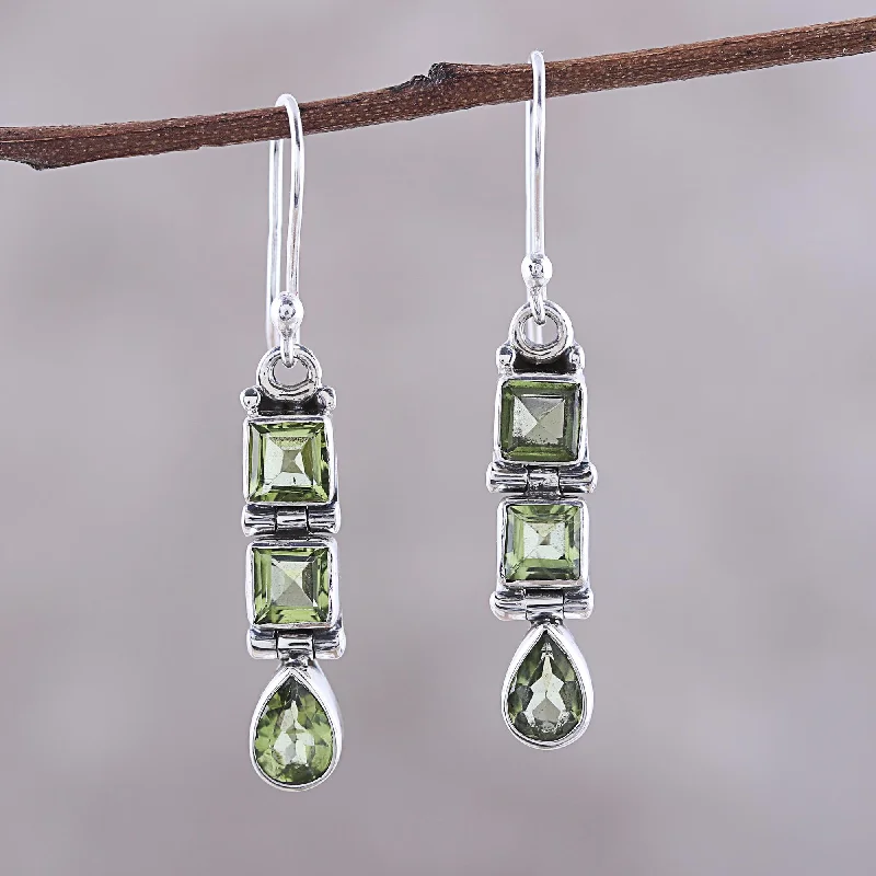 Hoop earrings with spiral designs for a dynamic and fluid look-Creativity 3.8-Carat Faceted Peridot Dangle Earrings from India