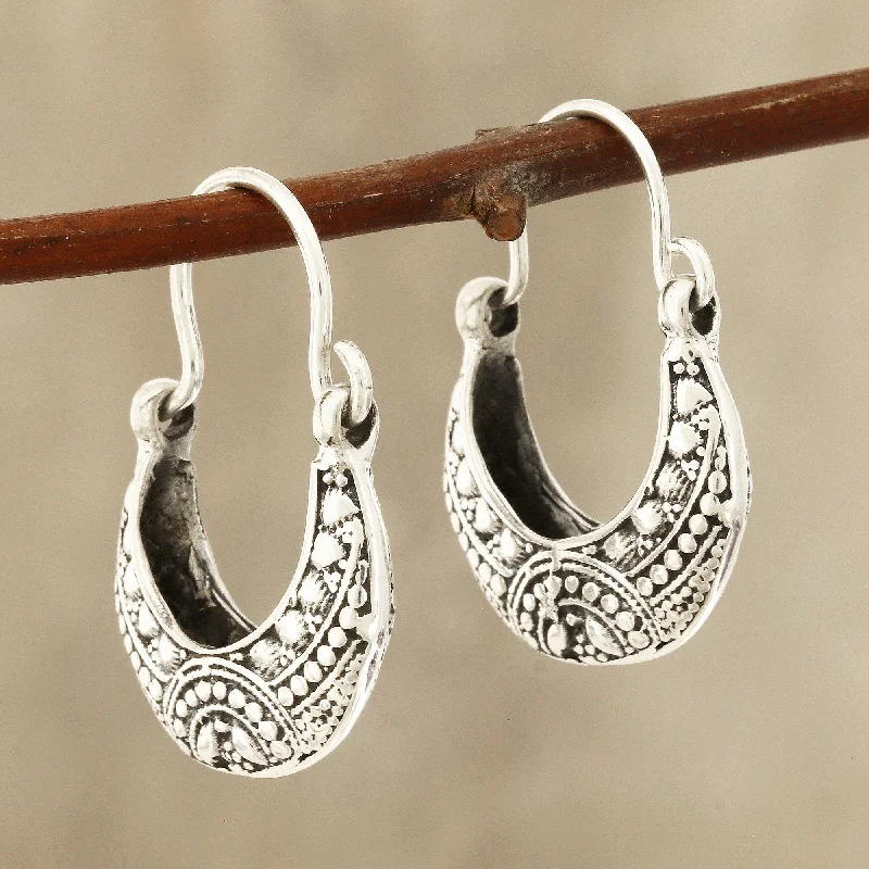 Hoop earrings with leather accents for a sleek and bold combination-Mystic Cradle Sterling Silver Hoop Earrings Crafted in India