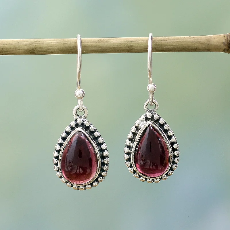 Hoop earrings with rhinestone-studded rims for a glamorous touch-Radiant Dewdrops Sterling Silver and Garnet Drop Shape Dangle Earrings