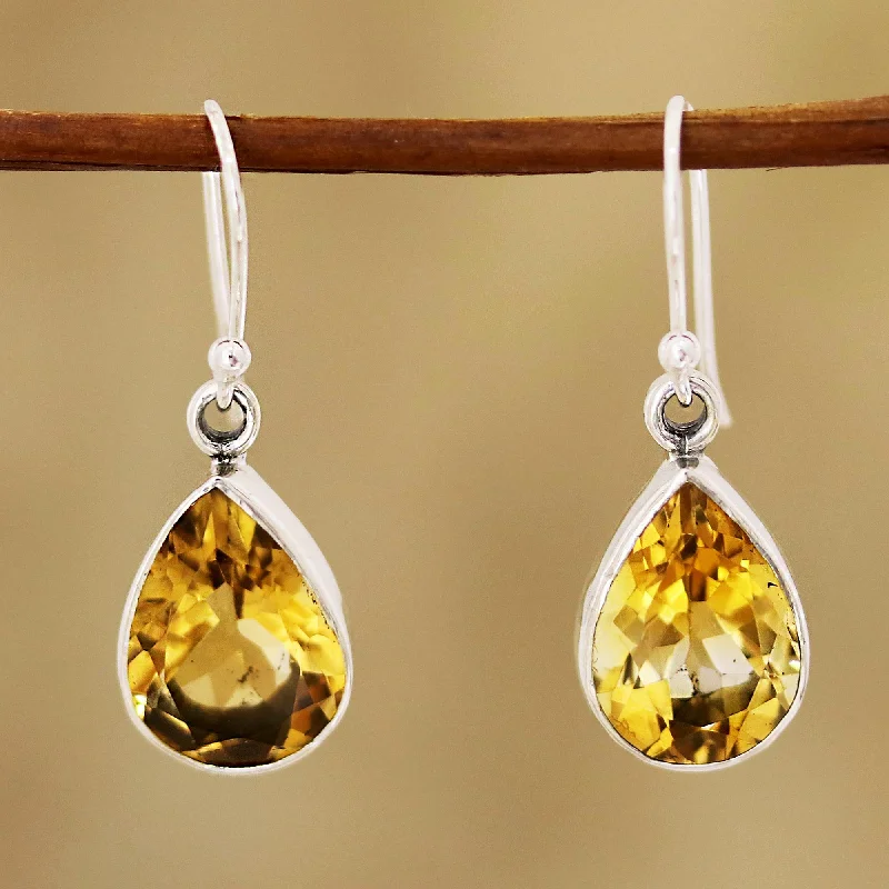 Best hoop earrings with matte finish for a sophisticated, understated design-Yellow Glimmer 9-Carat Teardrop Citrine Dangle Earrings from India